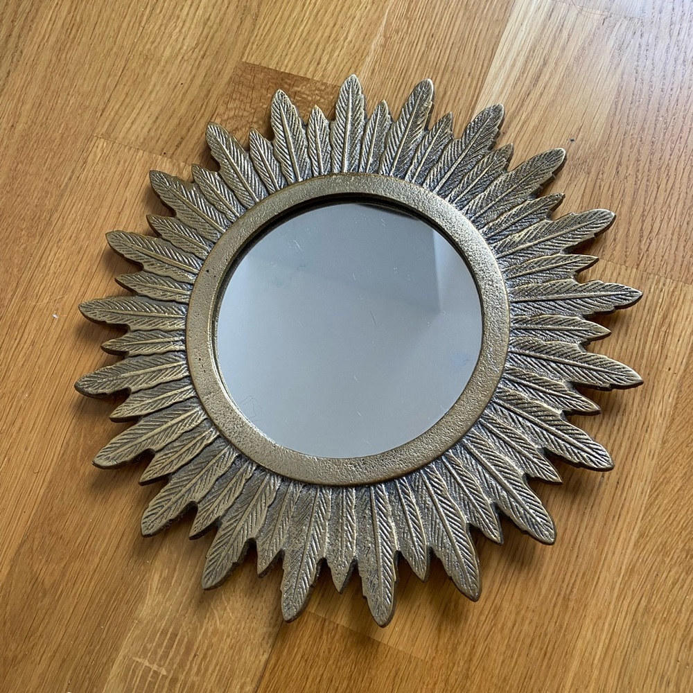 Gold sunburst mirror. Mid century style. Purchased from H&M home for $29.99.